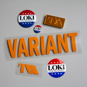 Loki Variant Variety Bundle - Belt Buckle, Sticker, Buttons, Iron-on Transfers